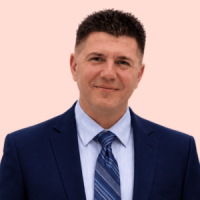 Man smiling with formal suit