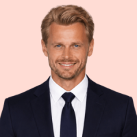 Man smiling with formal suit